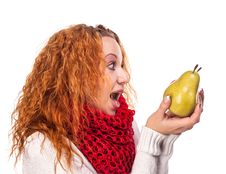 Red-haired Girl With A Pears Royalty Free Stock Images