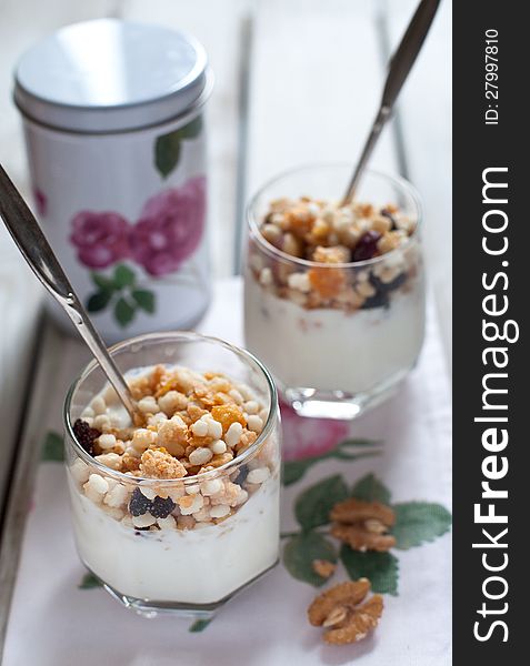 Gluten free muesli with natural yogurt in glasses