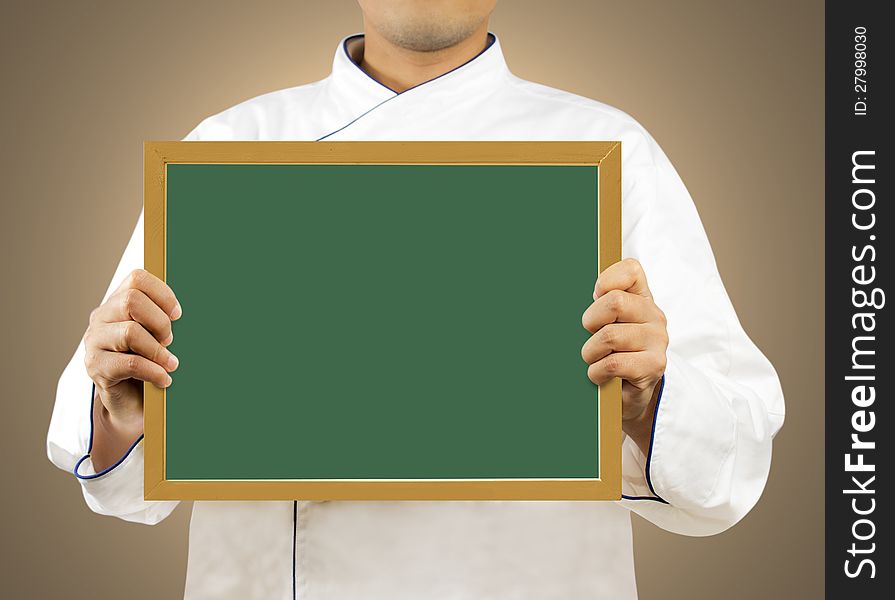 Chef showing blank chalkboard, Display the menu. Chef showing blank chalkboard, Display the menu