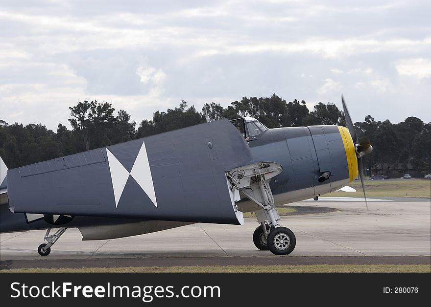 Grumman TBM-3R Avenger on the runway with its wings folded