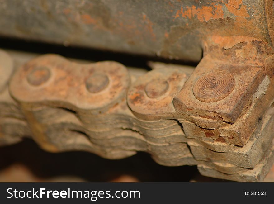 Rusty links of large chain drive ... construction