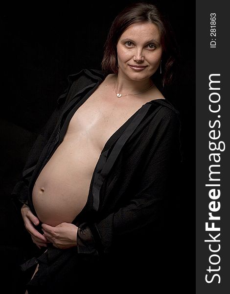 Pregnant Woman On Black