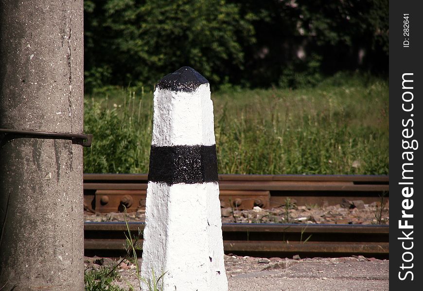 Railroad post with railroad.