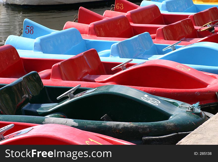 7 Pedalo Boats on the River Dee In Chester England. 7 Pedalo Boats on the River Dee In Chester England