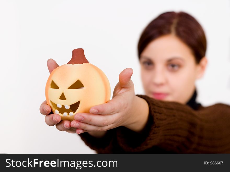 Girl holding a halloween pumpkin. Girl holding a halloween pumpkin