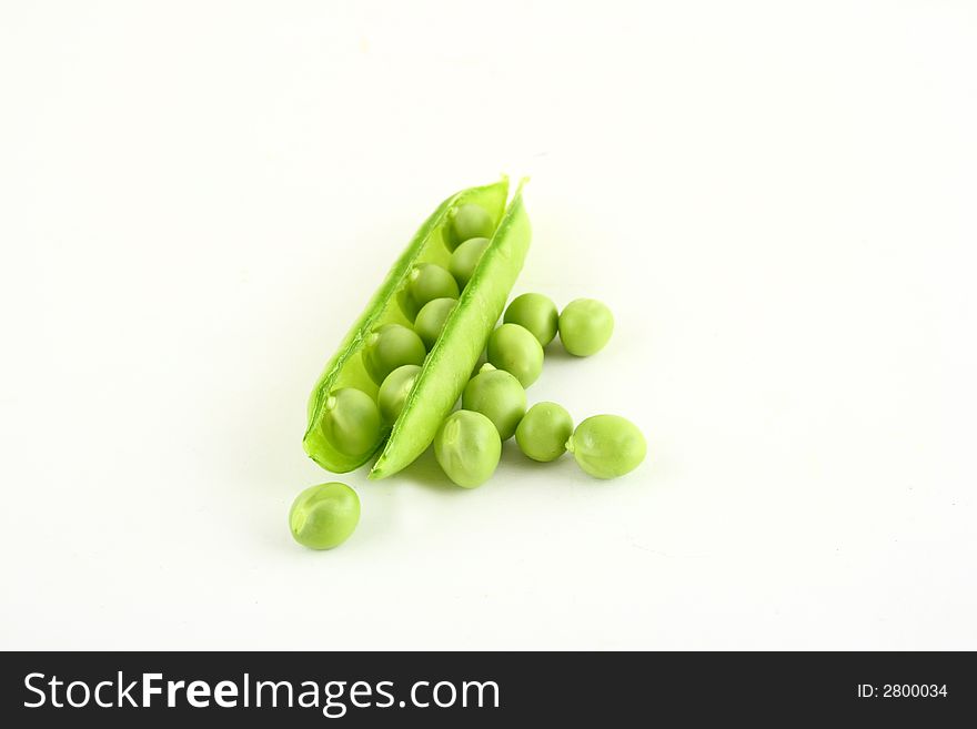 Close-up of green pea pods with depth of field