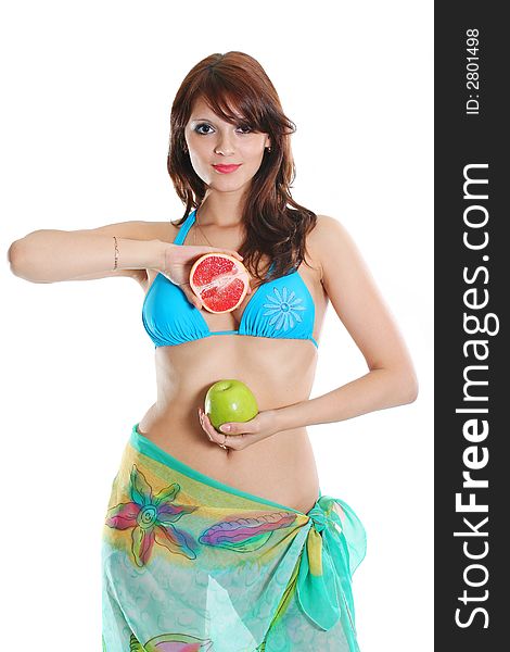 The beautiful sexual girl in bikini with fruit. The beautiful sexual girl in bikini with fruit