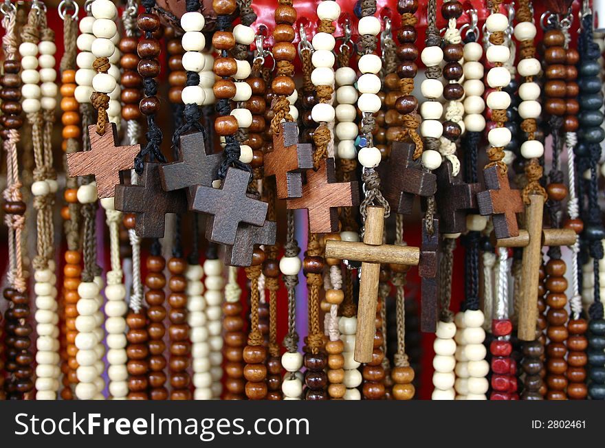An assorted group of crosses from a street shop close to a catholic church. An assorted group of crosses from a street shop close to a catholic church.