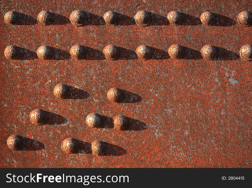 Grunge metal plate of an old bridge. Grunge metal plate of an old bridge