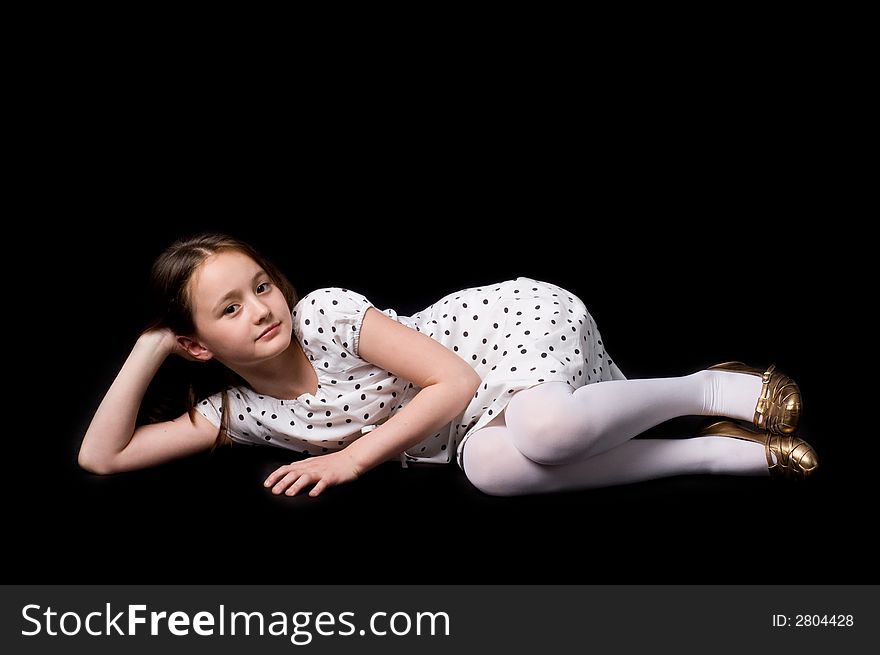 The girl in studio on a black background. The girl in studio on a black background