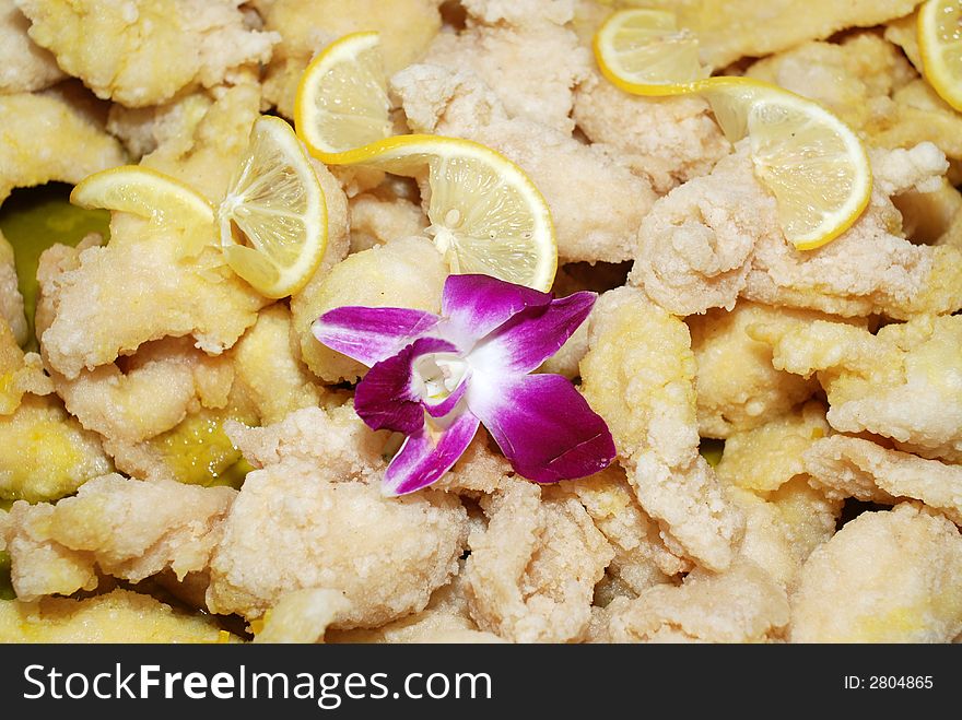 Lemon and fried chicken meats