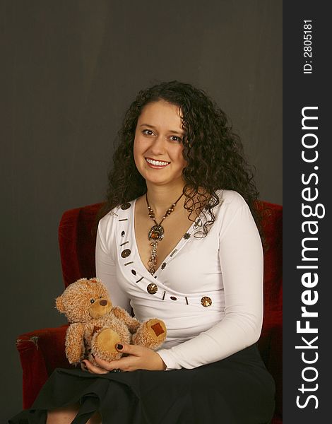 Smiling girl with little bear. Smiling girl with little bear