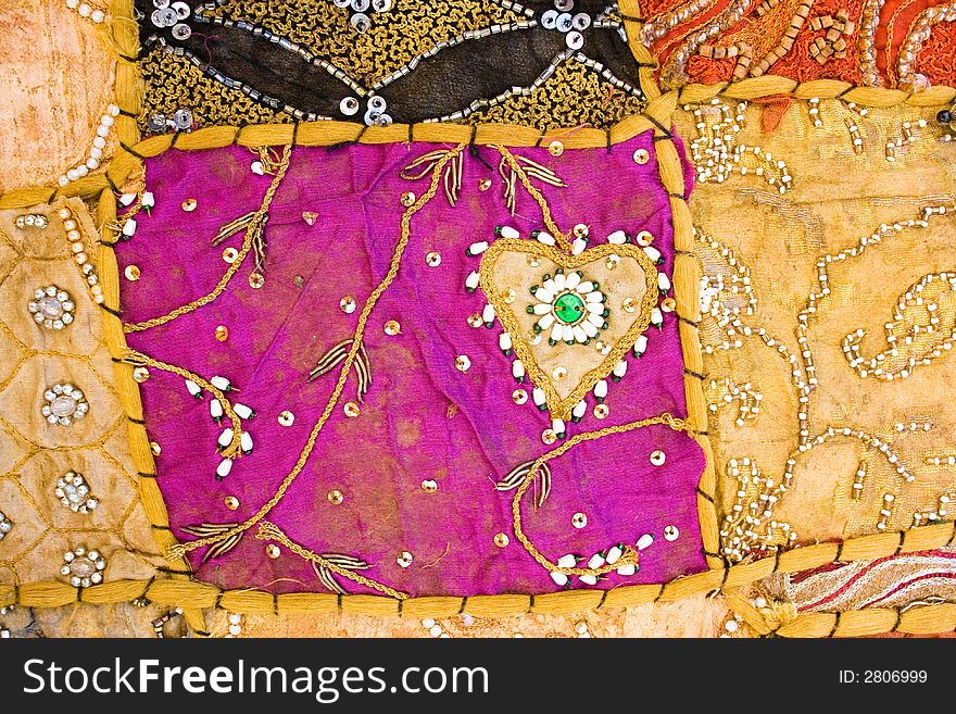 Fragment of ancient colorful blanket