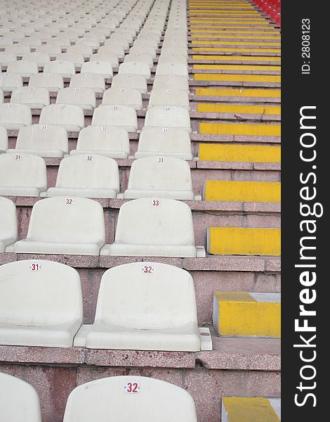 White stadion chairs in europe,Stadium seats
A field of empty stadium seats.