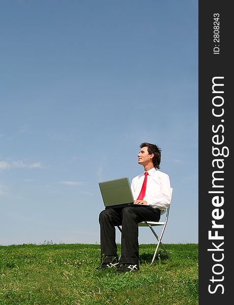 Man Using Laptop Outdoors