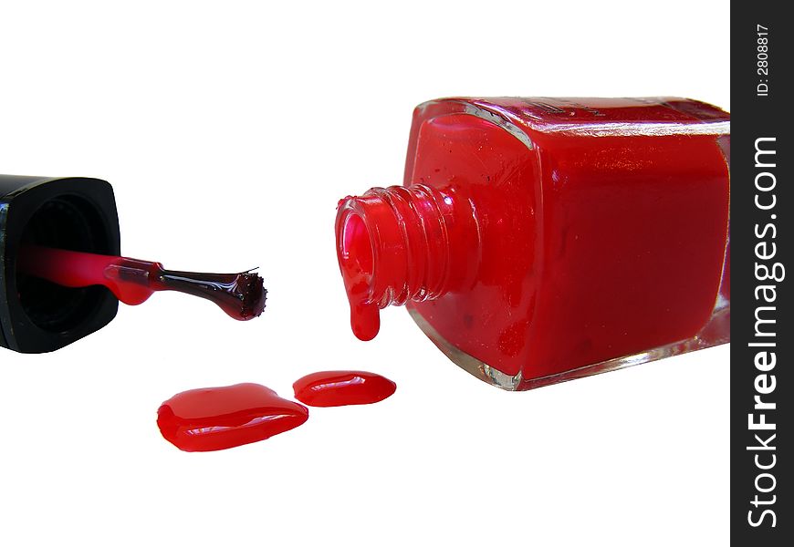 A bottle of red nailpolish dripping, isolated on white. A bottle of red nailpolish dripping, isolated on white