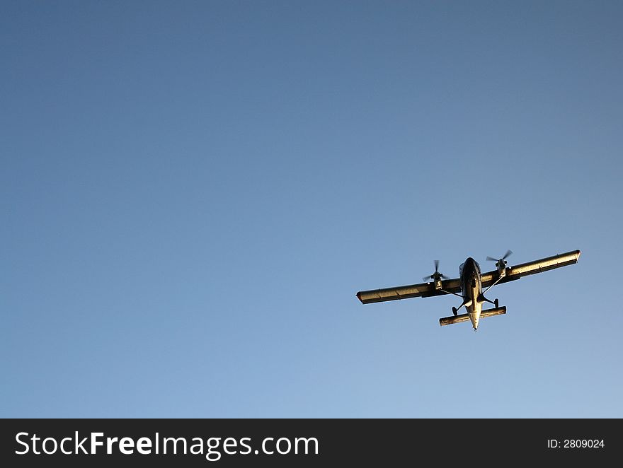 Airplane in the blue sky