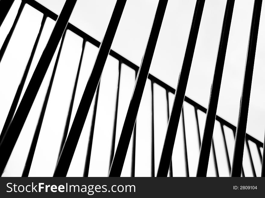 An abstract photograph of a silhouetted railing. Suitable as backgound. An abstract photograph of a silhouetted railing. Suitable as backgound