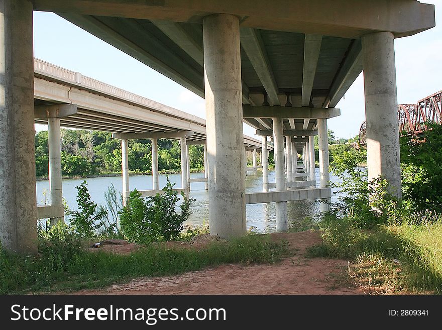 The concrete supports and frame of a bridge