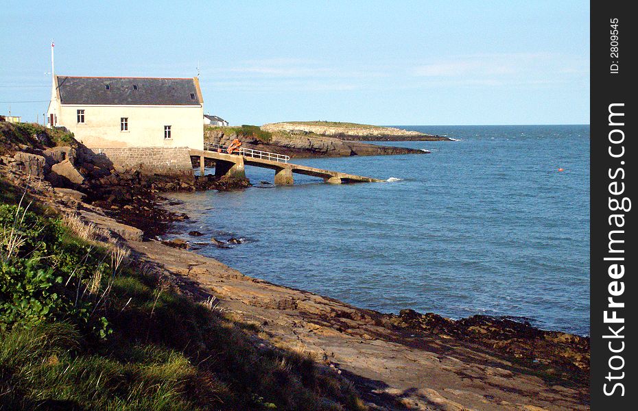 Part of the rugged Anglesey coastal walk looking towards the lifeboat station. Part of the rugged Anglesey coastal walk looking towards the lifeboat station