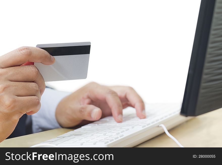 Business man paying online with his credit card