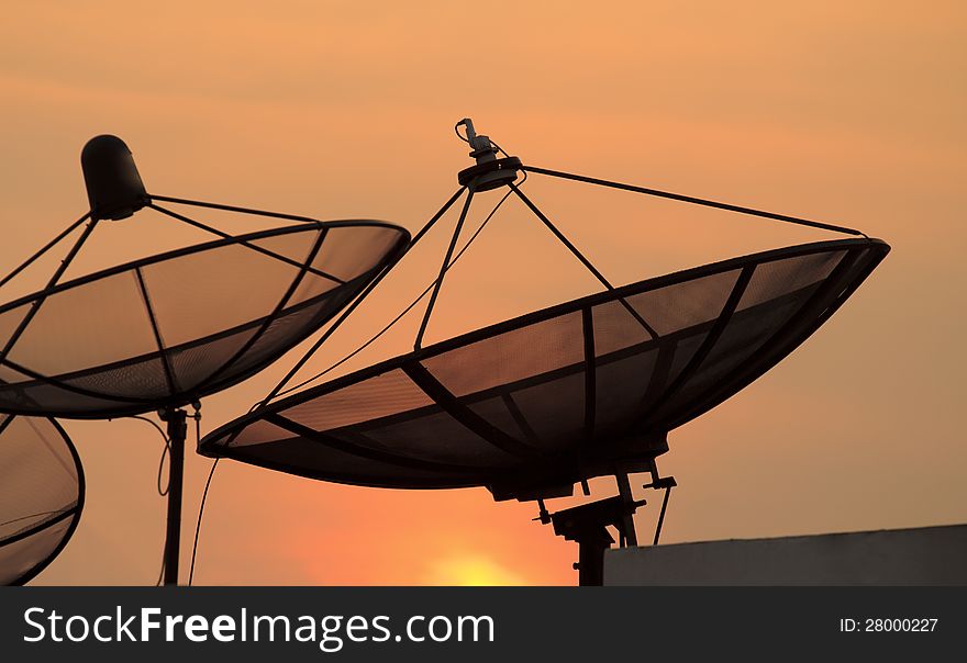 Satellite dish Silhouettes at sunset. Satellite dish Silhouettes at sunset