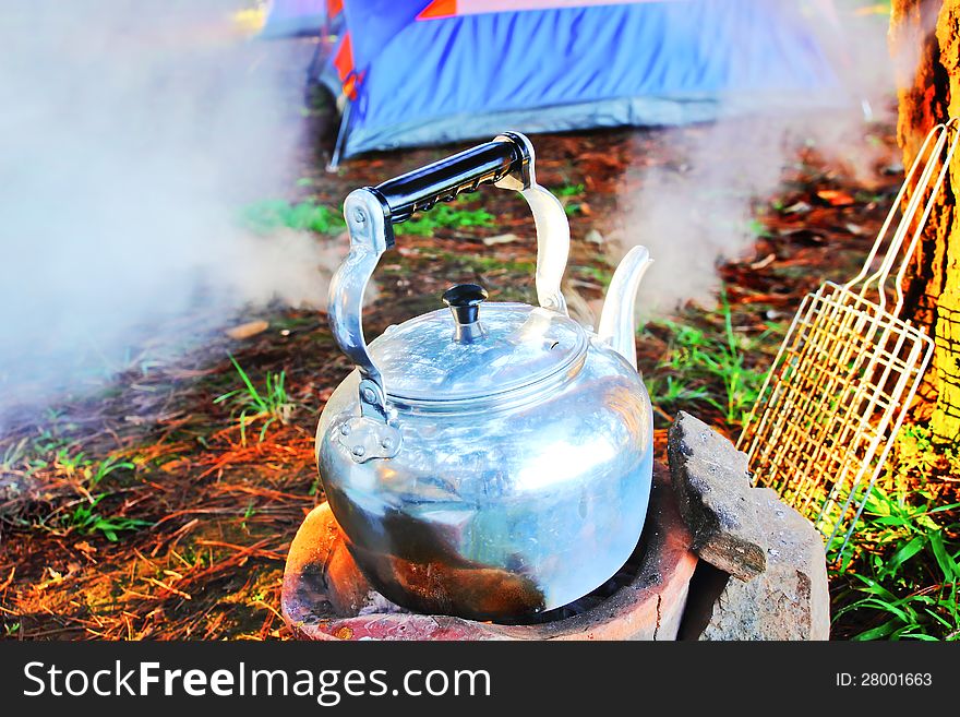 Kettle on the fire in the forest