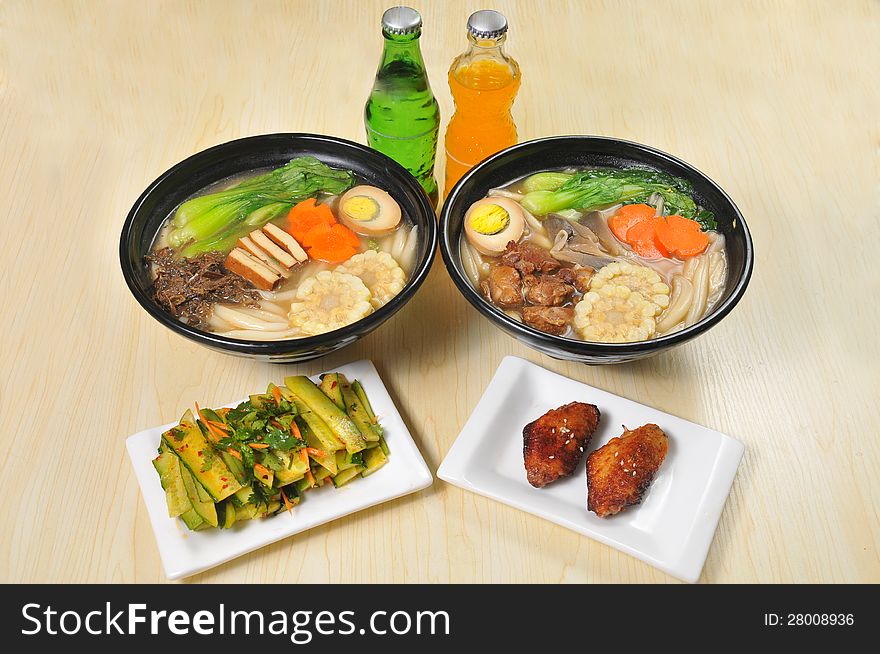 Chinese noodles with egg and vegetablesï¼ŒSoda and vegetable salad. Chinese noodles with egg and vegetablesï¼ŒSoda and vegetable salad