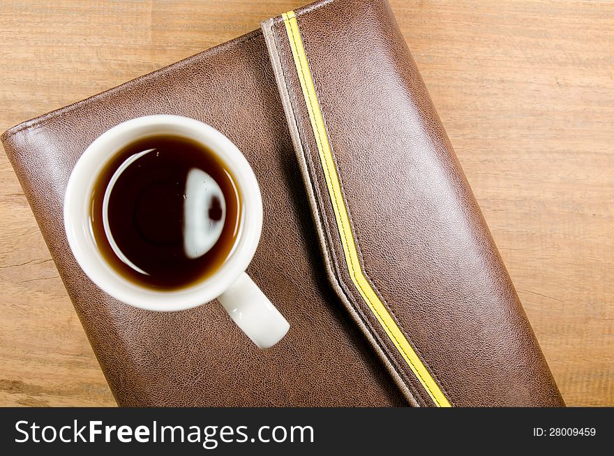 Tea cup with notebook