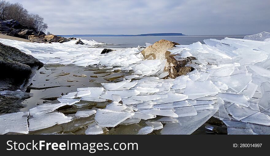 Shards Of Ice Falling On The Seashore
