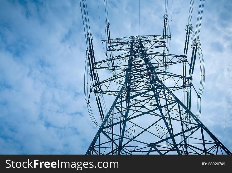 Electricity tower in the blue sky and white clouds. Electricity tower in the blue sky and white clouds