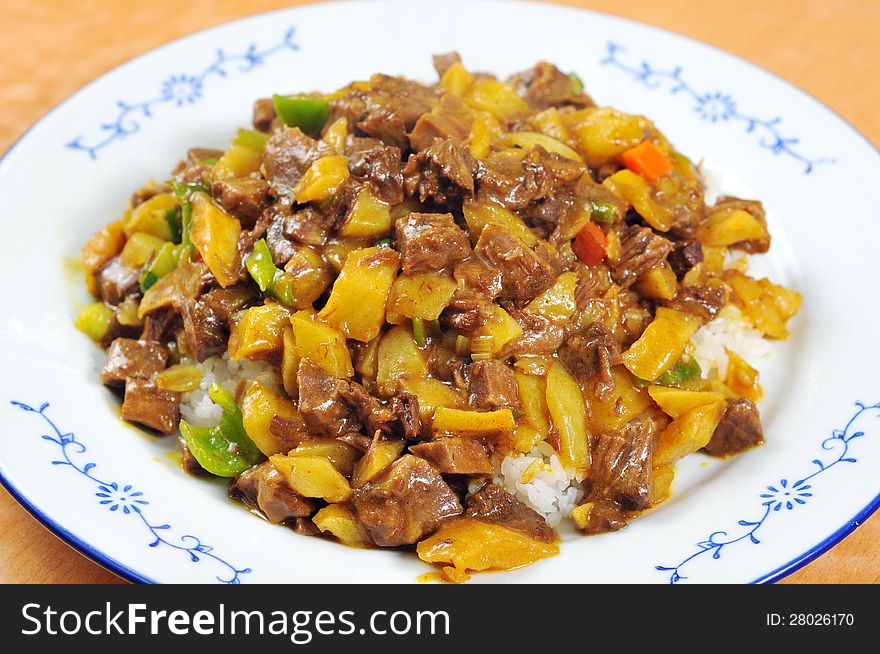 Chinese cuisine - beef, potatoes and rice
