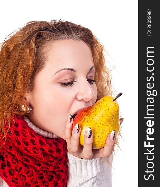 Red-haired girl want to eat a pears isolated on white. Red-haired girl want to eat a pears isolated on white