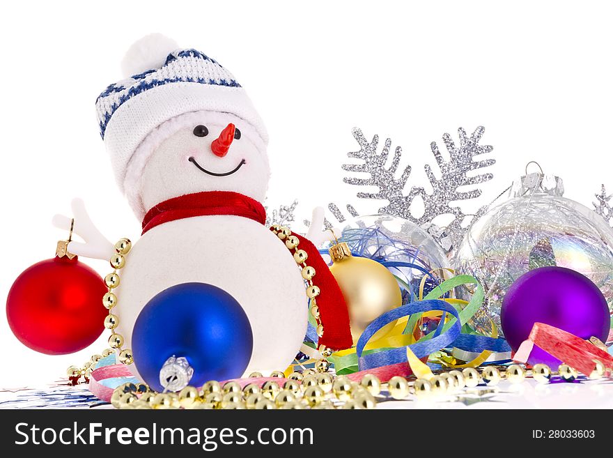 Snowman in a white and blue cap on a white background with Christmas balls, decorations, snowflakes and confetti. Snowman in a white and blue cap on a white background with Christmas balls, decorations, snowflakes and confetti.