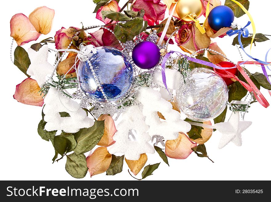 Christmas concept shot with Christmas decorations, baubles, dry roses and petals, confetti and Christmas tinsel. Christmas concept shot with Christmas decorations, baubles, dry roses and petals, confetti and Christmas tinsel.