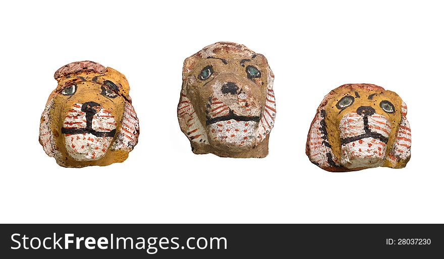 Ancient lion head figures isolated.