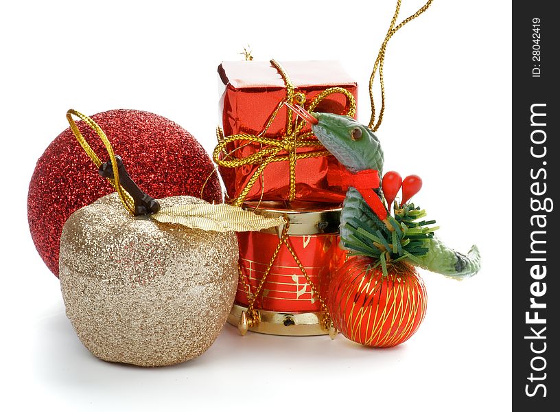 New Year Decoration with Red and Gold Baubles, Gift Box and Handmade Symbol of 2013 isolated on white background