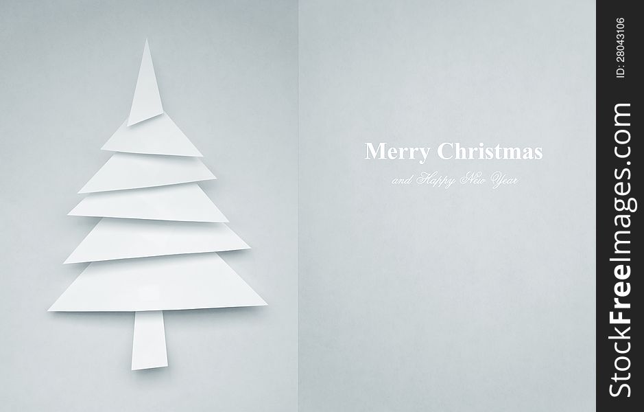 Greeting Card of christmas tree made of paper for your design