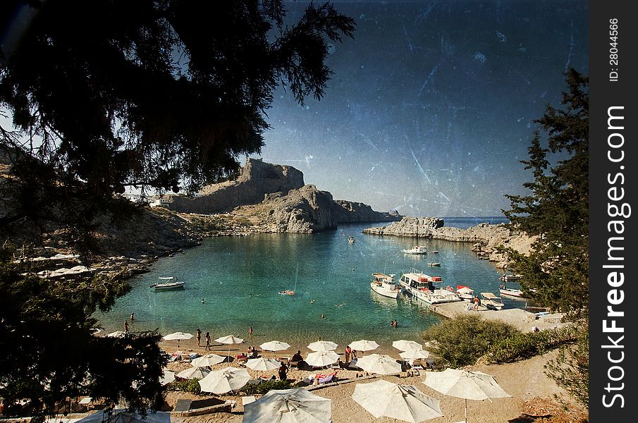 Vintage postcard from torquois hidden bay in Rhodes Greece