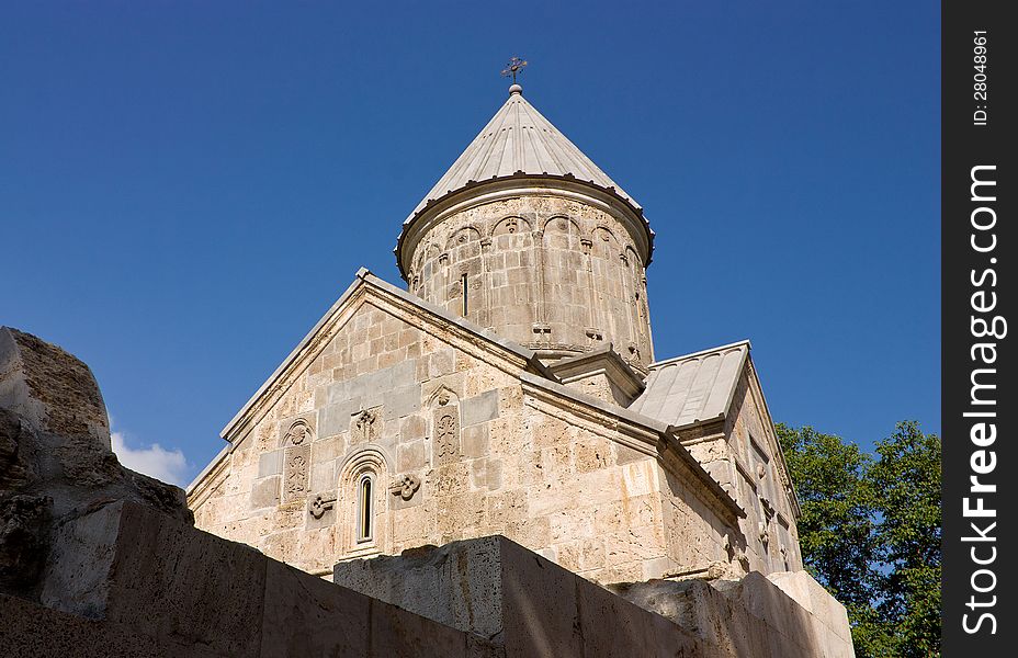 Ancient Armenian church against the blue sky,Armenia. Ancient Armenian church against the blue sky,Armenia.