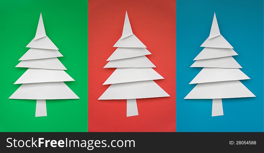 Three Christmas trees made of paper for design