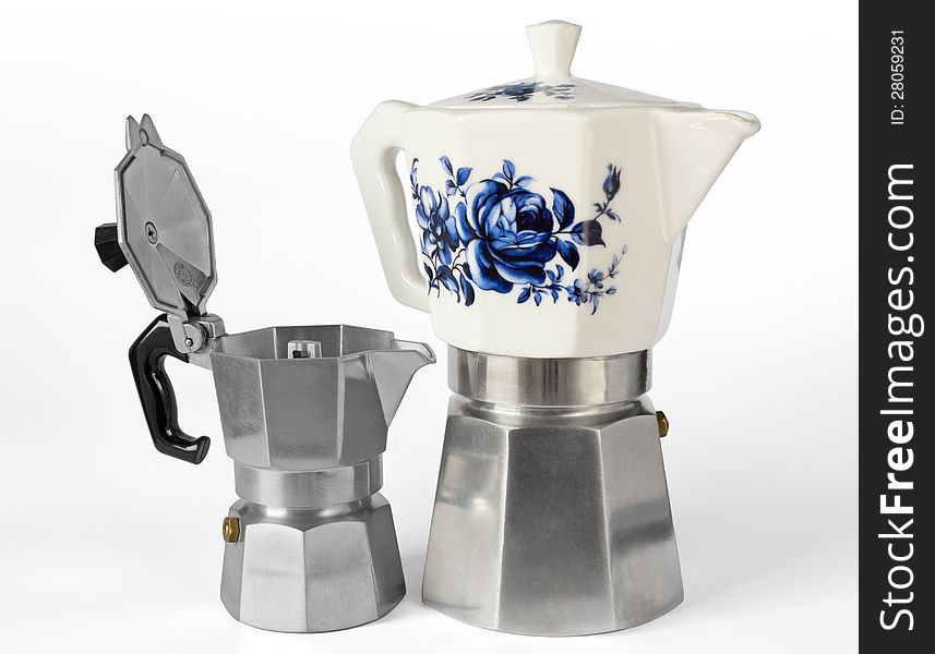 Two Italian coffee makers: a very small one and a bigger one with a ceramic top half and a flower decoration