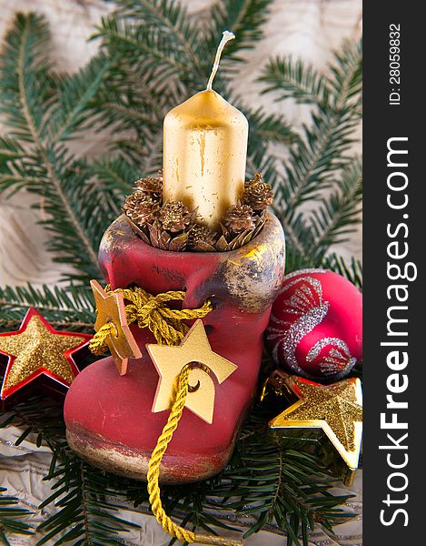 Candle in a shoe christmas ornament