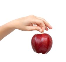 Woman Hand On Isolated Holding A Red Apple Royalty Free Stock Photos Woman Hand On Isolated Holding A Red Apple Royalty Free Stock Photos