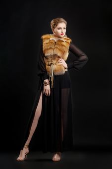 Woman In Fur Coat Over Black Background Posing Stock Image Woman In Fur Coat Over Black Background Posing Stock Image