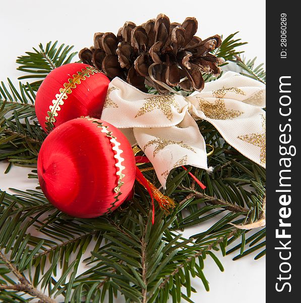 Red baubles with a white and golden bow