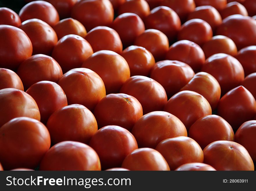 A display of beautiful red home grown tomatoes