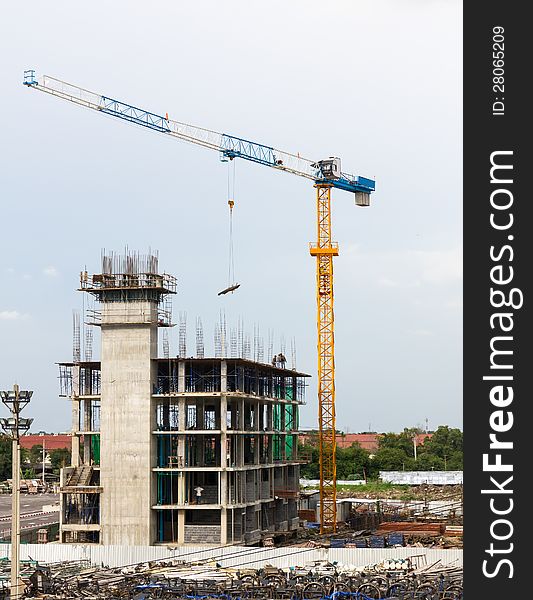 Building crane and building in construction site