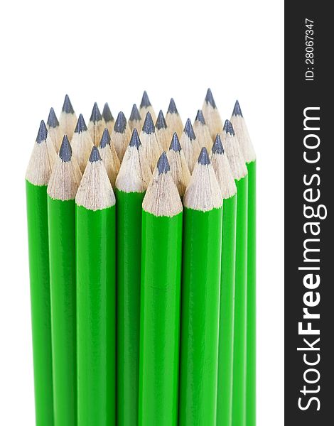 Green pencil with black pencil on a white background. Green pencil with black pencil on a white background