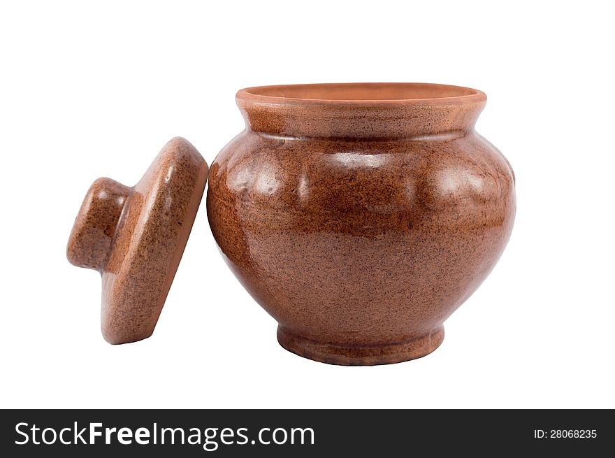 Clay pot with a cover isolated on a white background